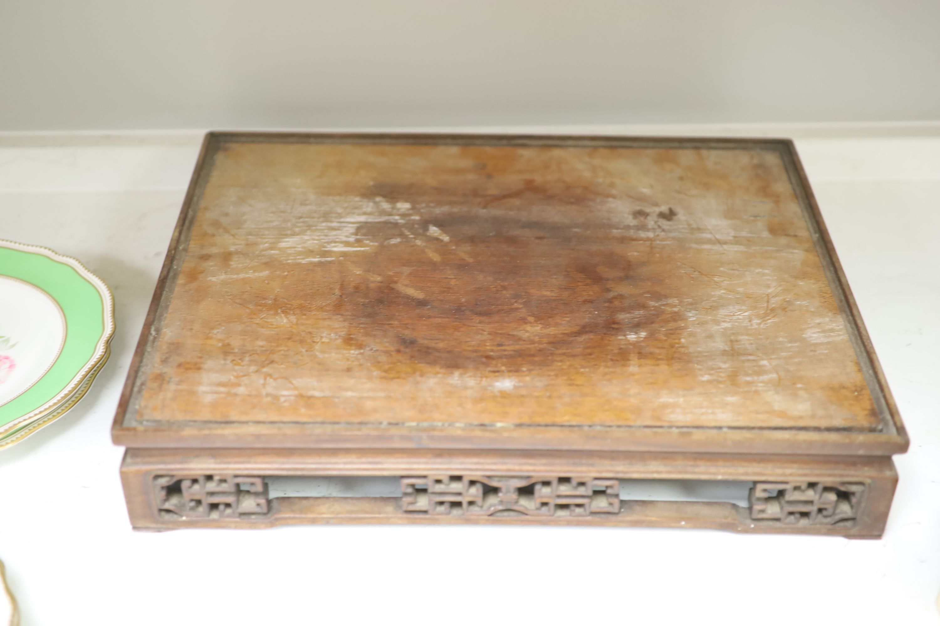 Three Chinese hardwood stands, 19th/20th century, largest 42.5 x 32cm